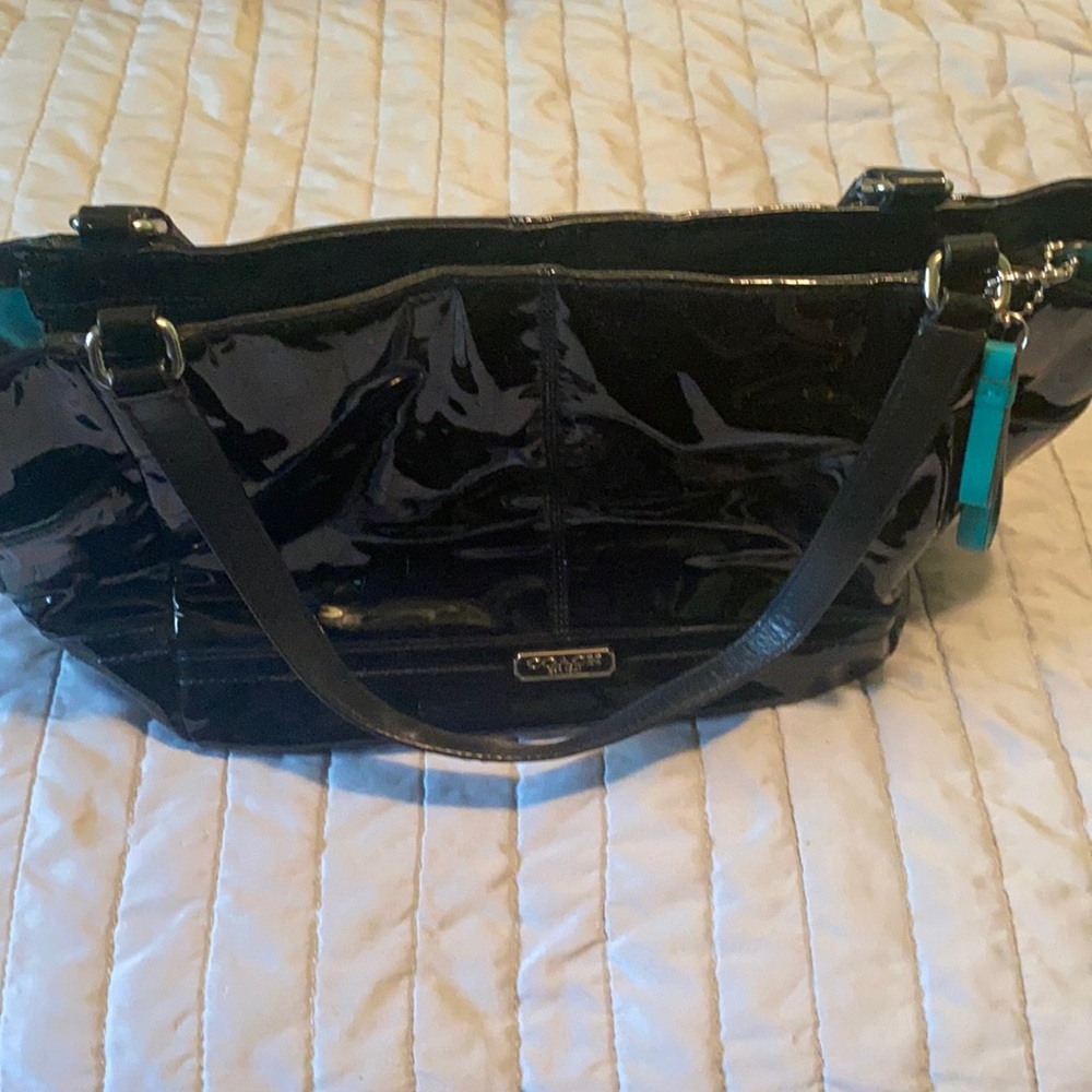 Black patent coach bag in perfect condition